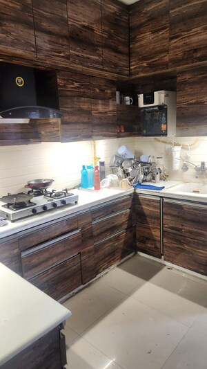 Kitchen in 3 BHK Apartment at Uninav Bliss, Raj Nagar Extension – for Rent
