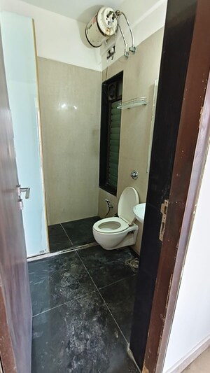 Bathroom in 2 BHK Apartment at Satellite Tower, Goregaon East – for Rent