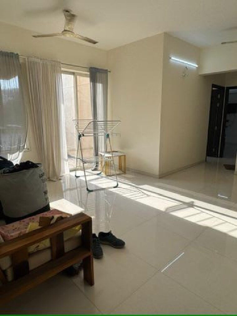 Living Room, nyati-erica 2 Bedroom 1100 Sq.Ft. Apartment In Undri Pune 10360119