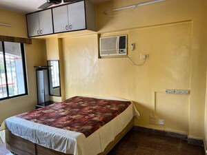 Bedroom in 2 BHK Apartment at Accord CHS Andheri West, Andheri West – for Rent