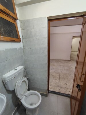 Bathroom in 3 BHK Apartment at Rohini Sector 14 – for Sale