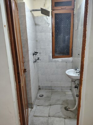 Bathroom in 3 BHK Apartment at Rohini Sector 14 – for Sale
