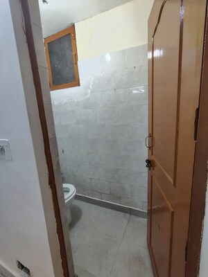 Bathroom in 3 BHK Apartment at Rohini Sector 14 – for Sale