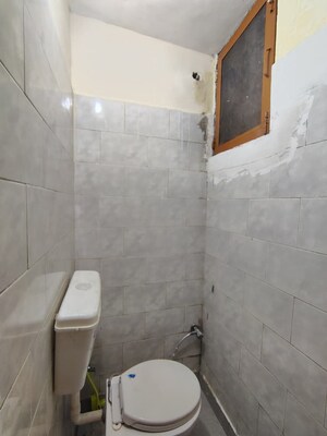 Bathroom in 3 BHK Apartment at Rohini Sector 14 – for Sale