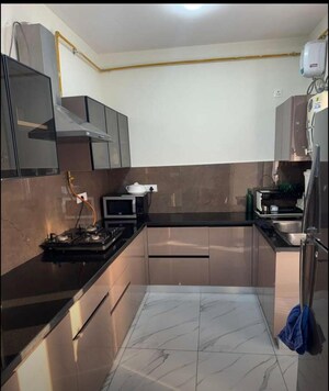 Kitchen in 2 BHK Apartment at Aura Gazania, Nabha – for Rent