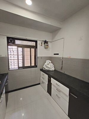 Kitchen in 2 BHK Apartment at Acme Ozone, Manpada – for Rent