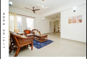 Living Room in 3 BHK Apartment at Emaar Palm Gardens, Sector 83 – for Sale