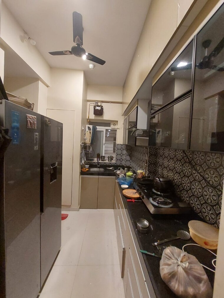 Kitchen, lodha-amara 2 Bedroom 1100 Sq.Ft. Apartment In Kolshet Road Thane 10365322