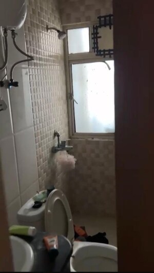 Bathroom in 2.5 BHK Apartment at Nimbus The Golden Palm, Sector 168 – for Rent