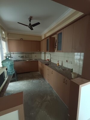 Kitchen in 2 BHK Apartment at Mahagun Mansion I and II, Vaibhav Khand – for Rent
