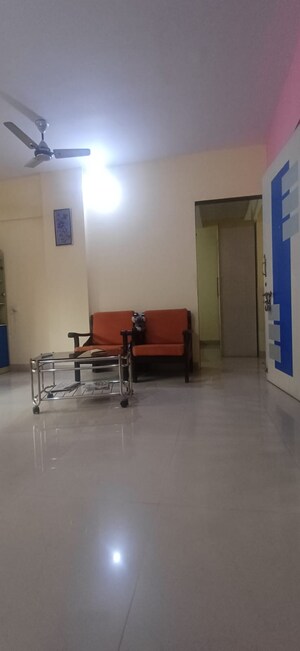 Living Room in 2 BHK Apartment at Nav Durga CHS, Naupada – for Sale