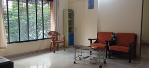 Living Room in 2 BHK Apartment at Nav Durga CHS, Naupada – for Sale