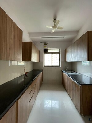 Kitchen in 2.5 BHK Apartment at Lodha Splendora, Ghodbunder Road – for Sale