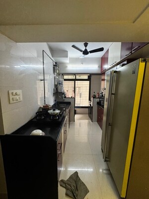 Kitchen in 2 BHK Apartment at United Unity Heights, Malad West – for Rent