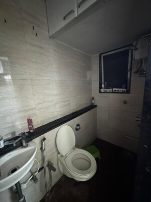 Bathroom in 2 BHK Apartment at United Unity Heights, Malad West – for Rent
