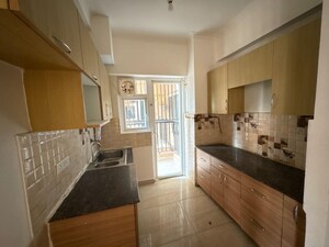 Kitchen in 3 BHK Apartment at Gaur City 2 - 14th Avenue, Sector 16c Greater Noida – for Sale