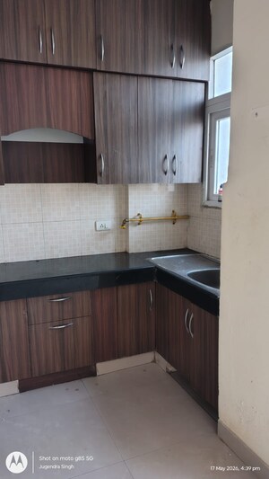 Kitchen in 2 BHK Apartment at Aims Golf City, Sector 75 – for Rent