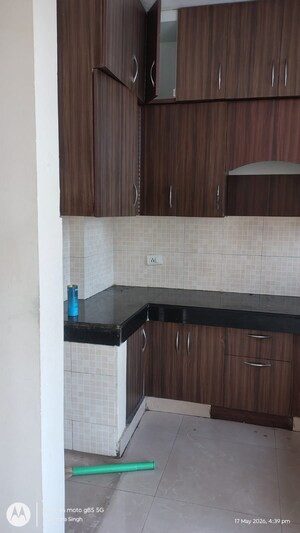 Kitchen in 2 BHK Apartment at Aims Golf City, Sector 75 – for Rent
