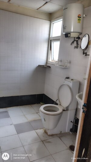 Bathroom in 2 BHK Apartment at Aims Golf City, Sector 75 – for Rent