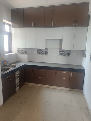 Kitchen in 3 BHK Apartment at Raj Nagar Extension – for Sale