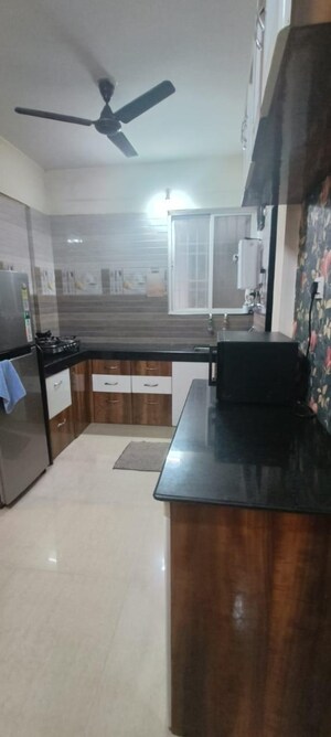 Kitchen in 2 BHK Apartment at LS Mehetre Laxmi Horizon, Punawale – for Rent