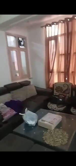 Living Room in 2 BHK Apartment at Raj Nagar Extension – for Sale