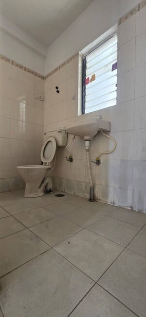 Bathroom in 2 BHK Apartment at Goodwill Orchids, Dhanori – for Rent