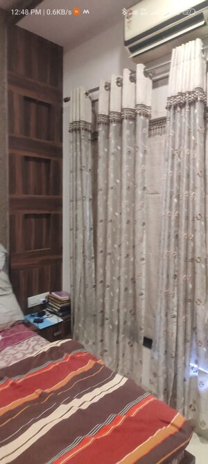 Bedroom in 2 BHK Apartment at K Raheja Heights, Malad East – for Rent