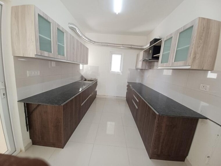 Kitchen, godrej-aqua 3 Bedroom 1025 Sq.Ft. Apartment In International Airport Road Bangalore 10401373
