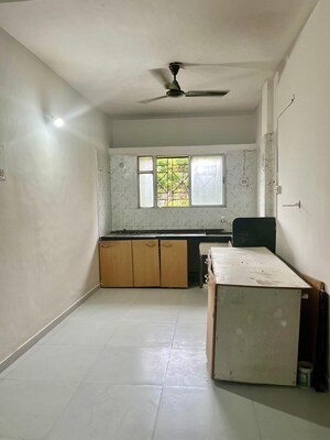 Kitchen in 2 BHK Apartment at Sukanto Roy Surobhi Enclave, Aundh – for Rent