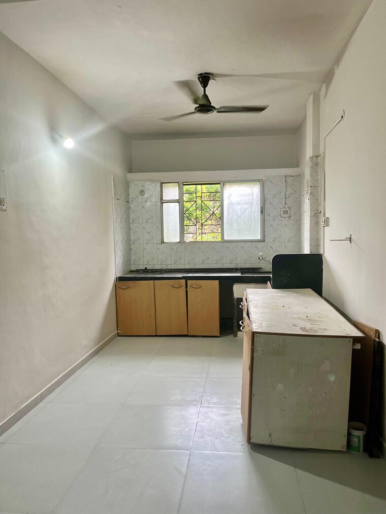 Kitchen, sukanto-roy-surobhi-enclave 2 Bedroom 850 Sq.Ft. Apartment In Aundh Pune 10401371