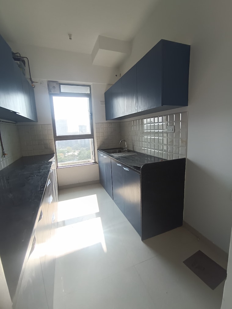 Kitchen, kalpataru-immensa-b 2 Bedroom 761 Sq.Ft. Apartment In Kolshet Road Thane 10401375