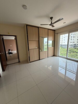 Living Room in 2 BHK Apartment at Puravankara Palm Beach, Hennur – for Rent