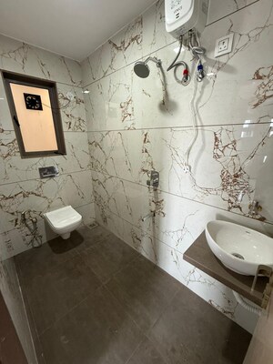 Bathroom in 2 BHK Apartment at Rangrekha CHS, Dahisar East – for Rent