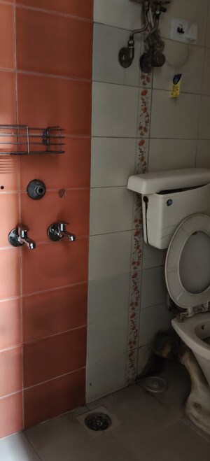 Bathroom in 1 BHK Apartment at Nav Joytiling CHS, Goregaon East – for Rent