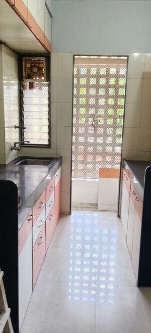 Kitchen in 1 BHK Apartment at Nav Joytiling CHS, Goregaon East – for Rent