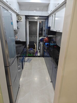 Kitchen in 2 BHK Apartment at Paradigm Ananda Residency, Borivali West – for Rent