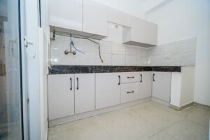 Kitchen in 3 BHK Apartment at Shri Radha Aqua Garden, Sector 16b Greater Noida – for Sale