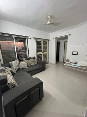 Living Room in 1 BHK Apartment at United Arise, Lohgaon – for Rent