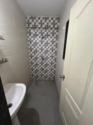 Bathroom in 1 BHK Apartment at United Arise, Lohgaon – for Rent