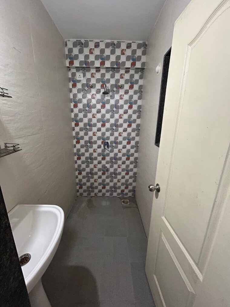 Bathroom, united-arise 1 Bedroom 600 Sq.Ft. Apartment In Lohgaon Pune 10401798