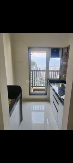 Kitchen in 1 BHK Apartment at Lodha Amara, Kolshet Road – for Sale