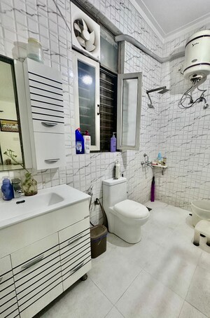 Bathroom in 1 BHK Builder Floor at Dharam Colony – for Rent