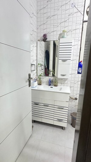 Bathroom in 1 BHK Builder Floor at Dharam Colony – for Rent