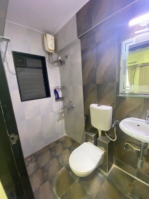 Bathroom in 1 BHK Apartment at Damji Shamji Kalpvruksha Tulip, Kasarvadavali – for Rent