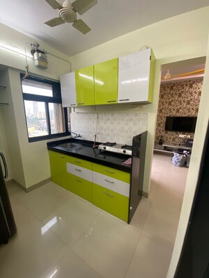 Kitchen in 1 BHK Apartment at Damji Shamji Kalpvruksha Tulip, Kasarvadavali – for Rent