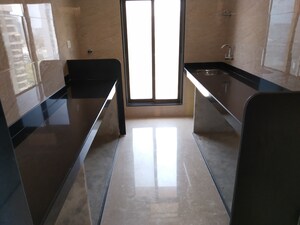 Kitchen in 2 BHK Apartment at Veera Desai Industrial Estate – for Sale