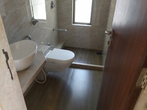 Bathroom in 2 BHK Apartment at Veera Desai Industrial Estate – for Sale