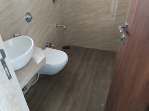 Bathroom in 2 BHK Apartment at Veera Desai Industrial Estate – for Sale