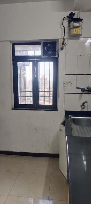 Kitchen in 4 BHK Apartment at Montreal Tower, Andheri West – for Sale